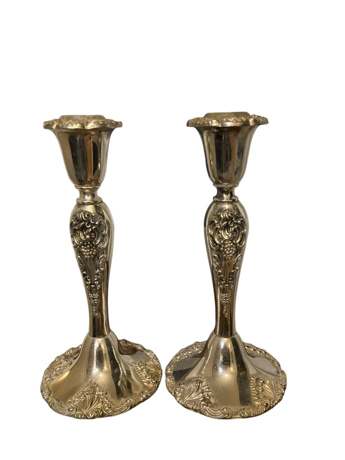 A Pair Of Silver Plated Godinger Baroque Style Candle Holders