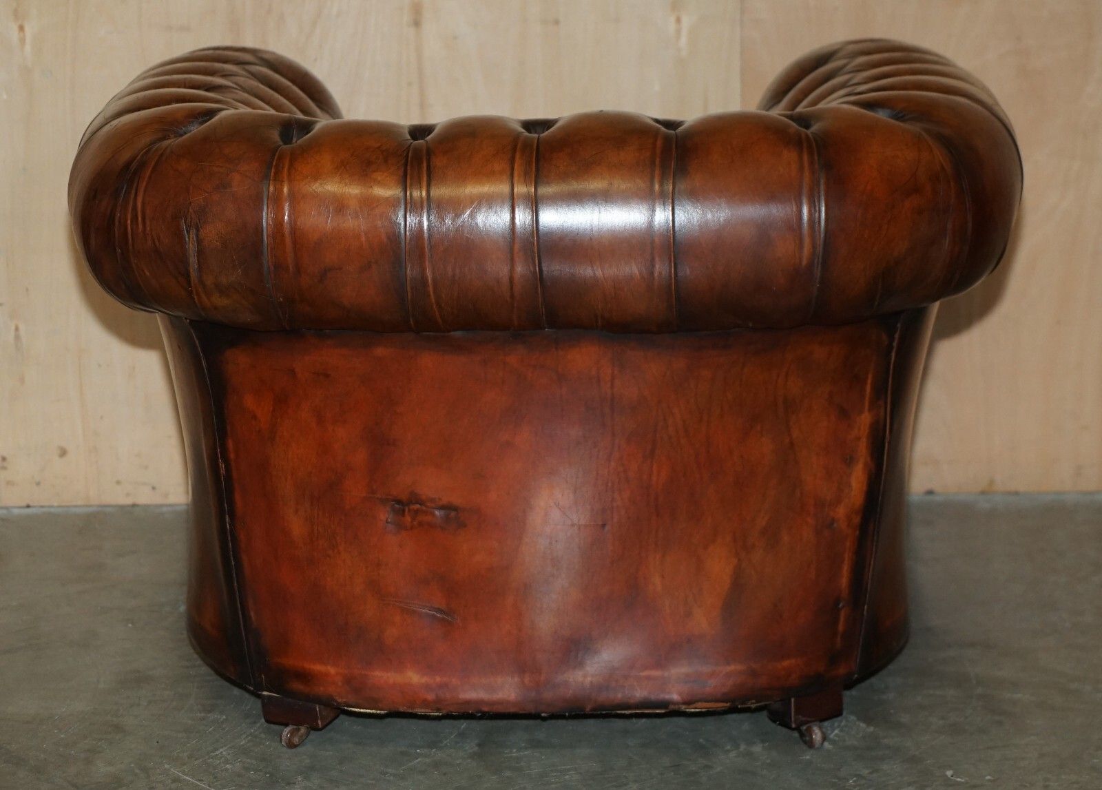 photo buy Restored Antique Chesterfield Club Armchair Brown Leather Porcelain Castors