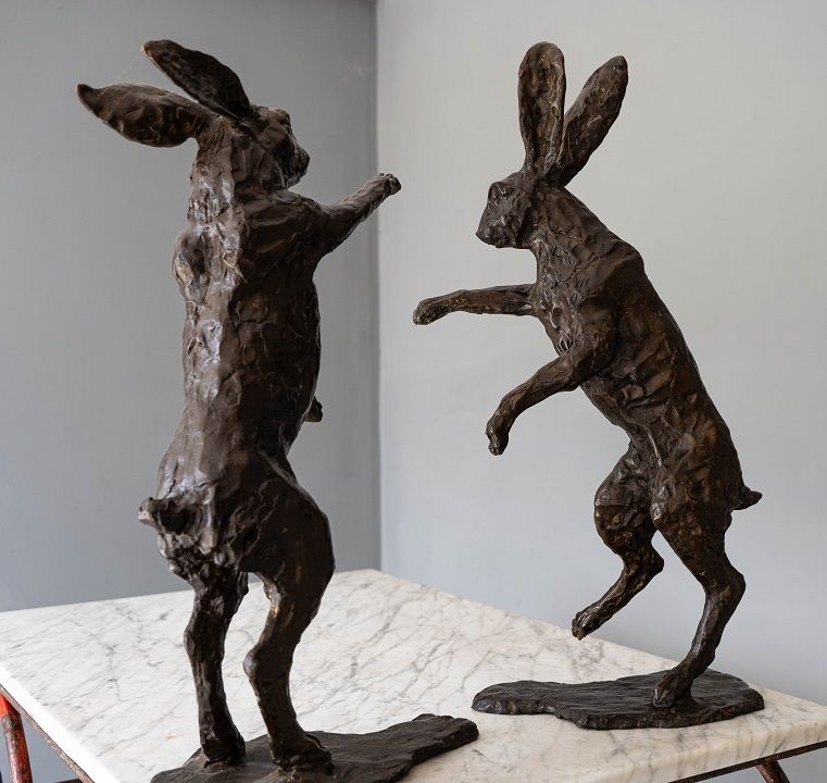 Pair Of Sculptured Boxing Hares In Bronze photo for sale