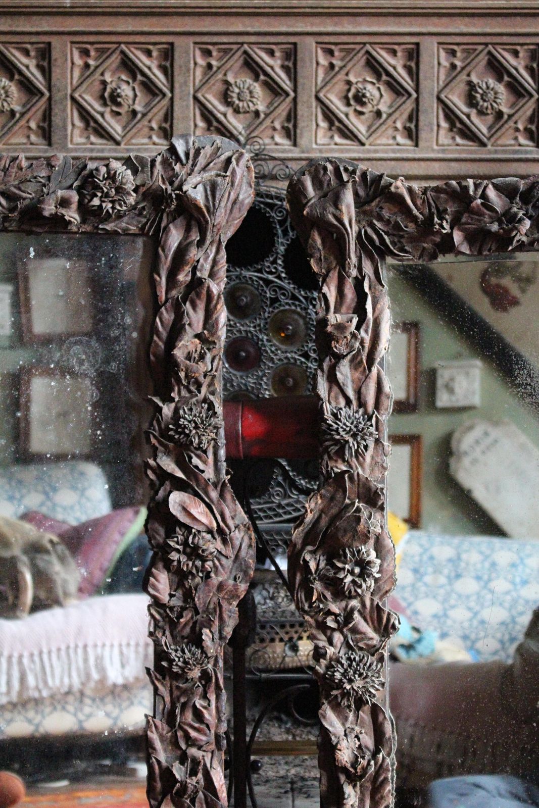 photo furniture 19th Century Pair Of French Chateau Leather Appliqué Floral Mercury Wall Mirrors