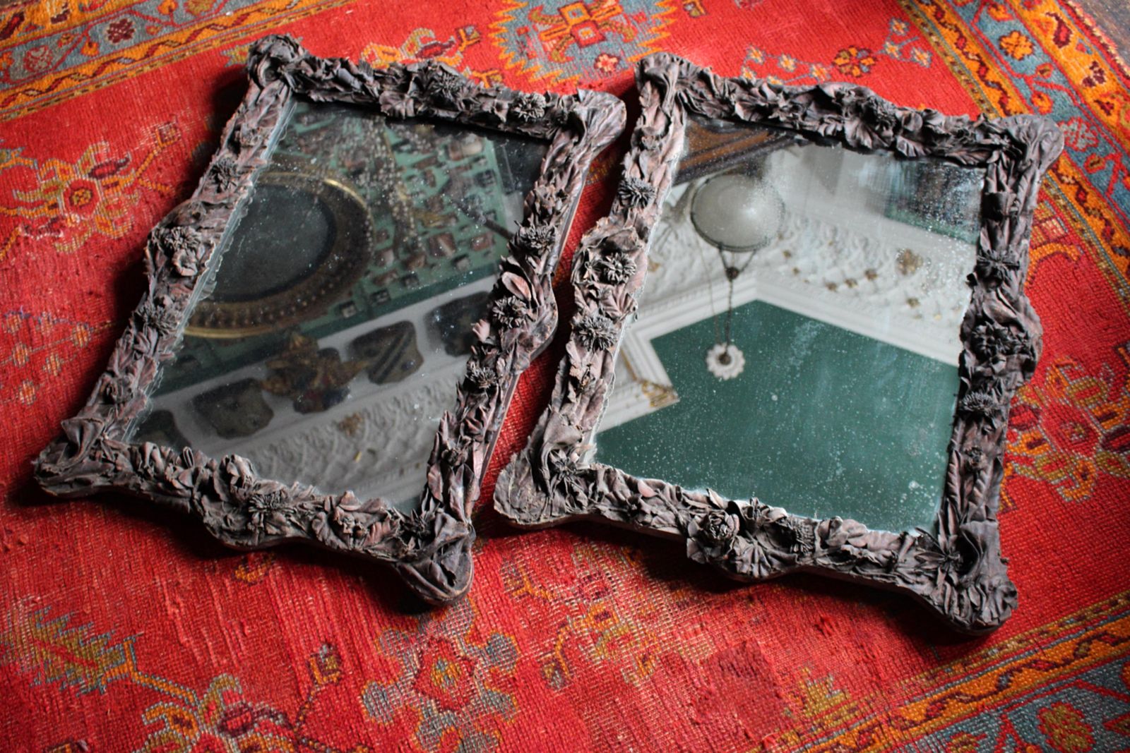 2362.0 19th Century Pair Of French Chateau Leather Appliqué Floral Mercury Wall Mirrors photo