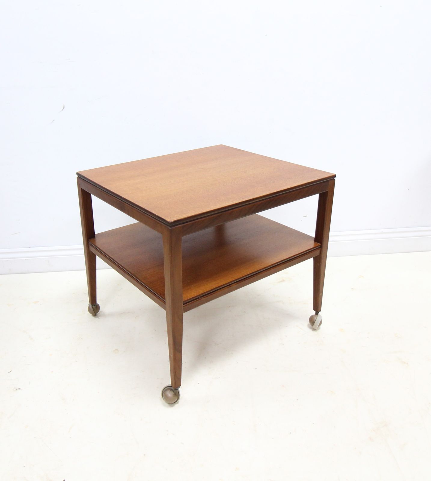 photo for sale Mid Century Danish Style 2 Tier Teak Side Table On Castors