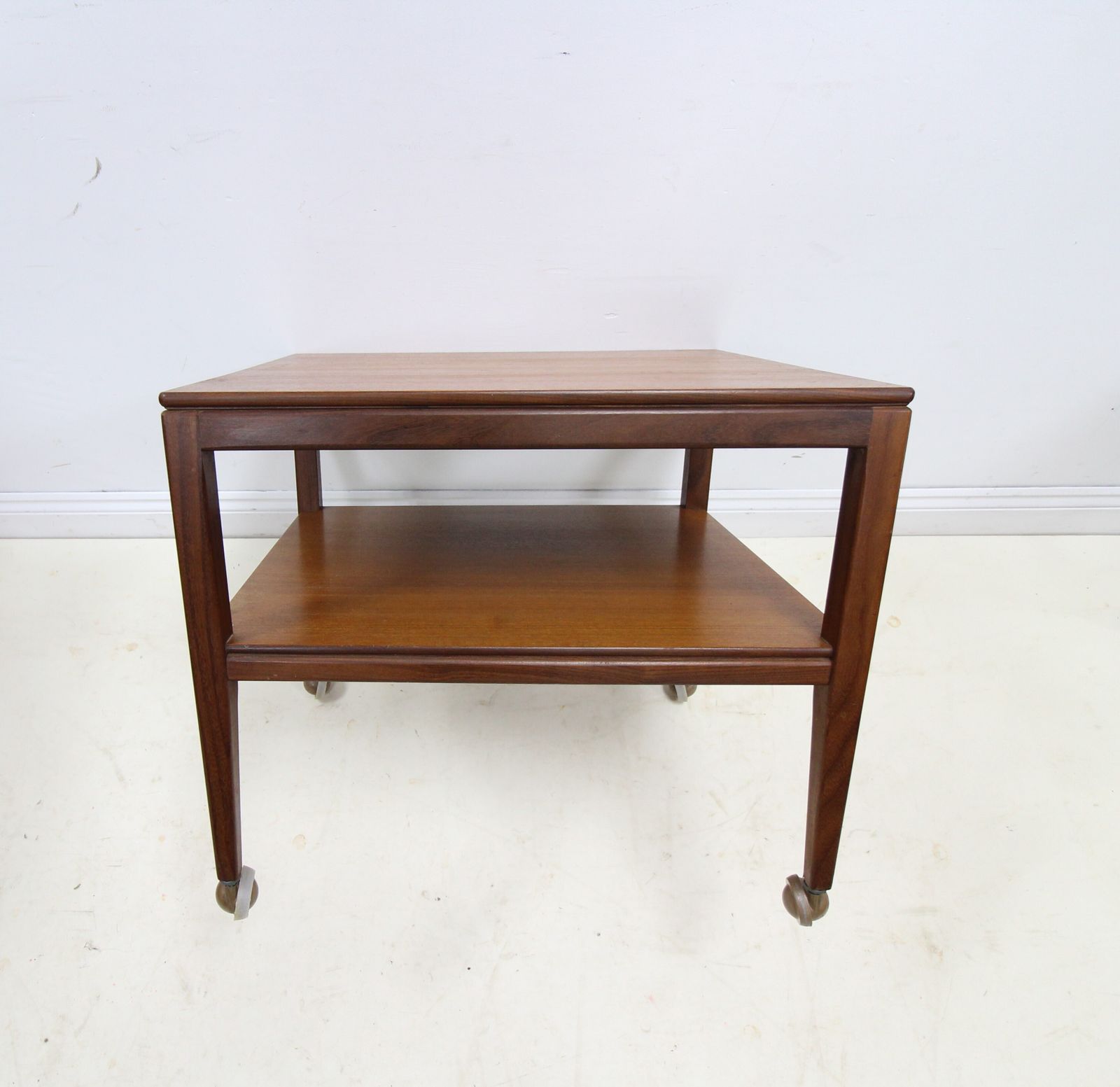 Mid Century Danish Style 2 Tier Teak Side Table On Castors photo Furniture