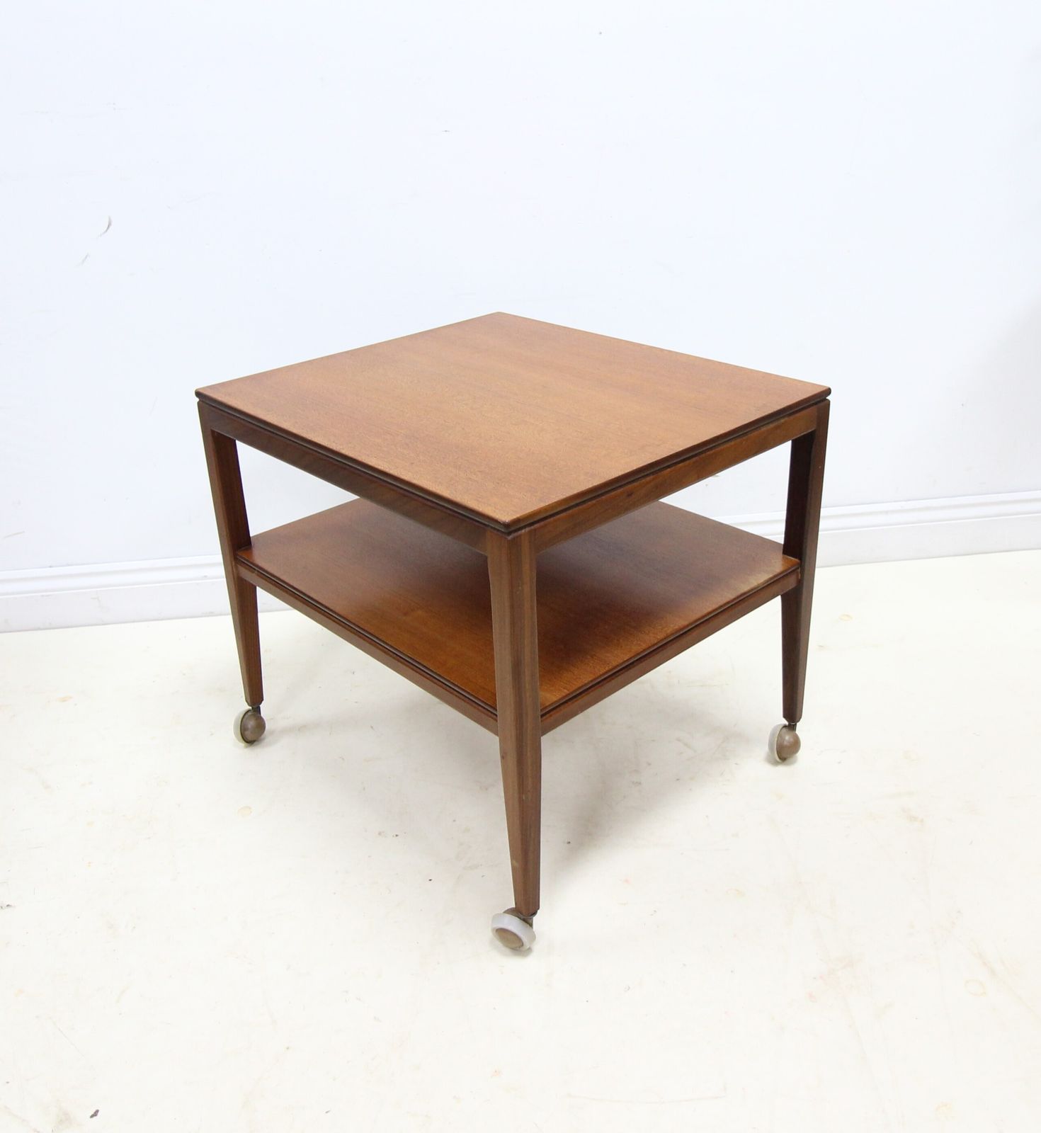 photo furniture Mid Century Danish Style 2 Tier Teak Side Table On Castors