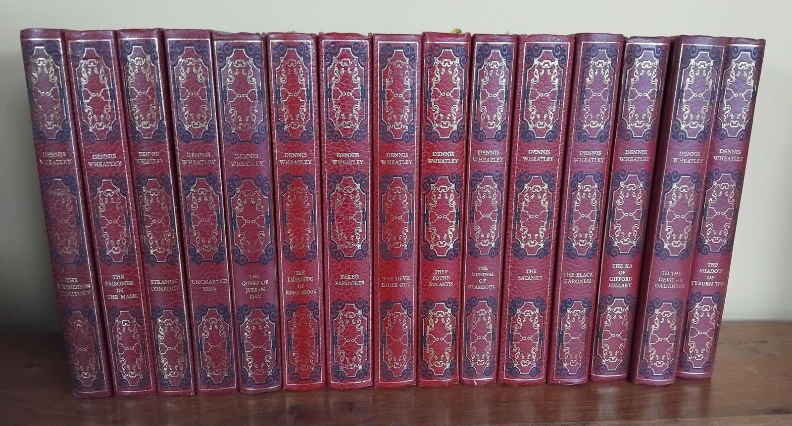 A Wonderful Complete Set Of 15 Dennis Wheatley Novels  Pen & Ink Illustrations, Deep Red Gilded Covers, Heron Books, 1970's