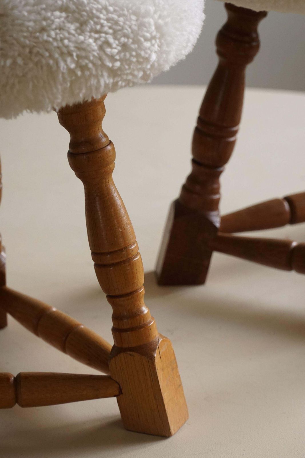 Furniture Danish Modern, A Pair Of Tripod Stools, Reupholstered Seats In Lambswool, 1950s photo