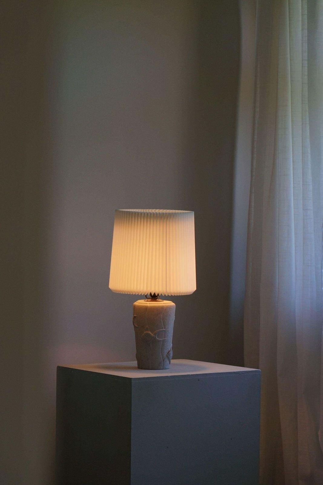 French Modern, A Vintage Table Lamp In Stone With Fish Motifs, 1970s photo vinterior