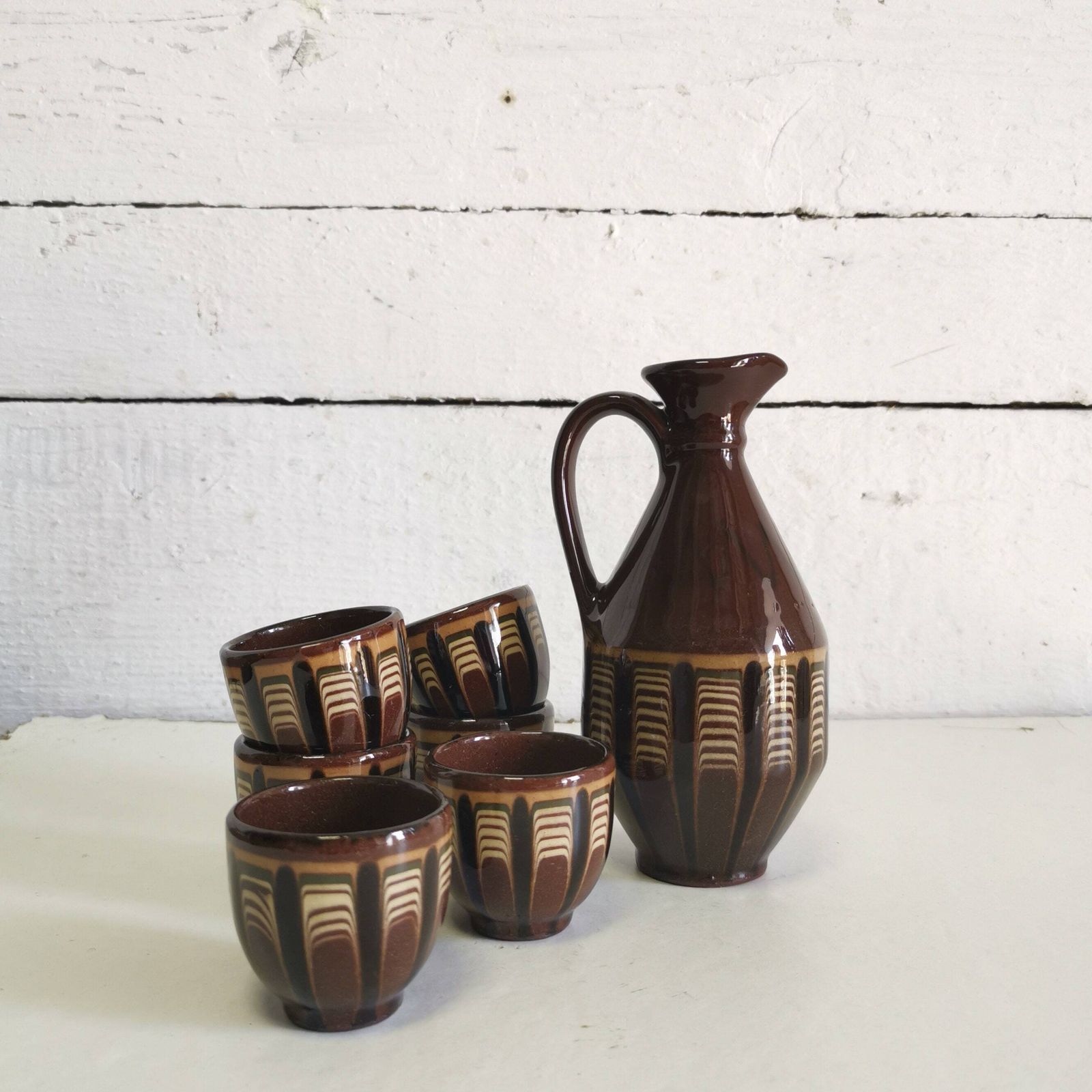 photo for sale Brown Jug And 6 Cup Set Bulgarian Folk Art Design Hand Made Ceramics Drinking Rakia, Shot Glass, Water Pitcher Traditional Design