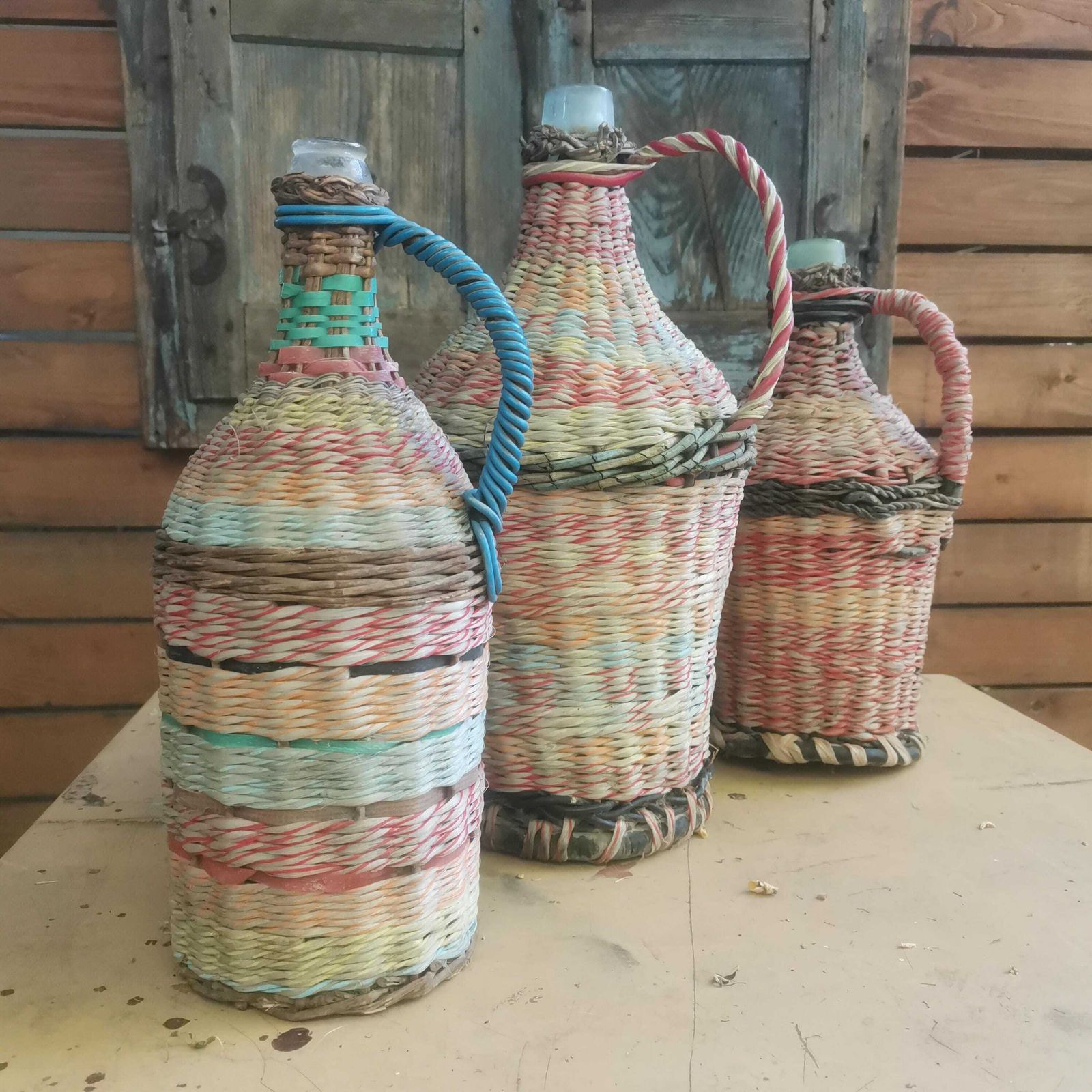 Brighten The Home Set Of 3 Weaved Wicker Bottles Colorful. Old Retro Plastic Decorated Pop Bottle Cafe Kitchen Decor Eye Catching Demijohn photo vintage