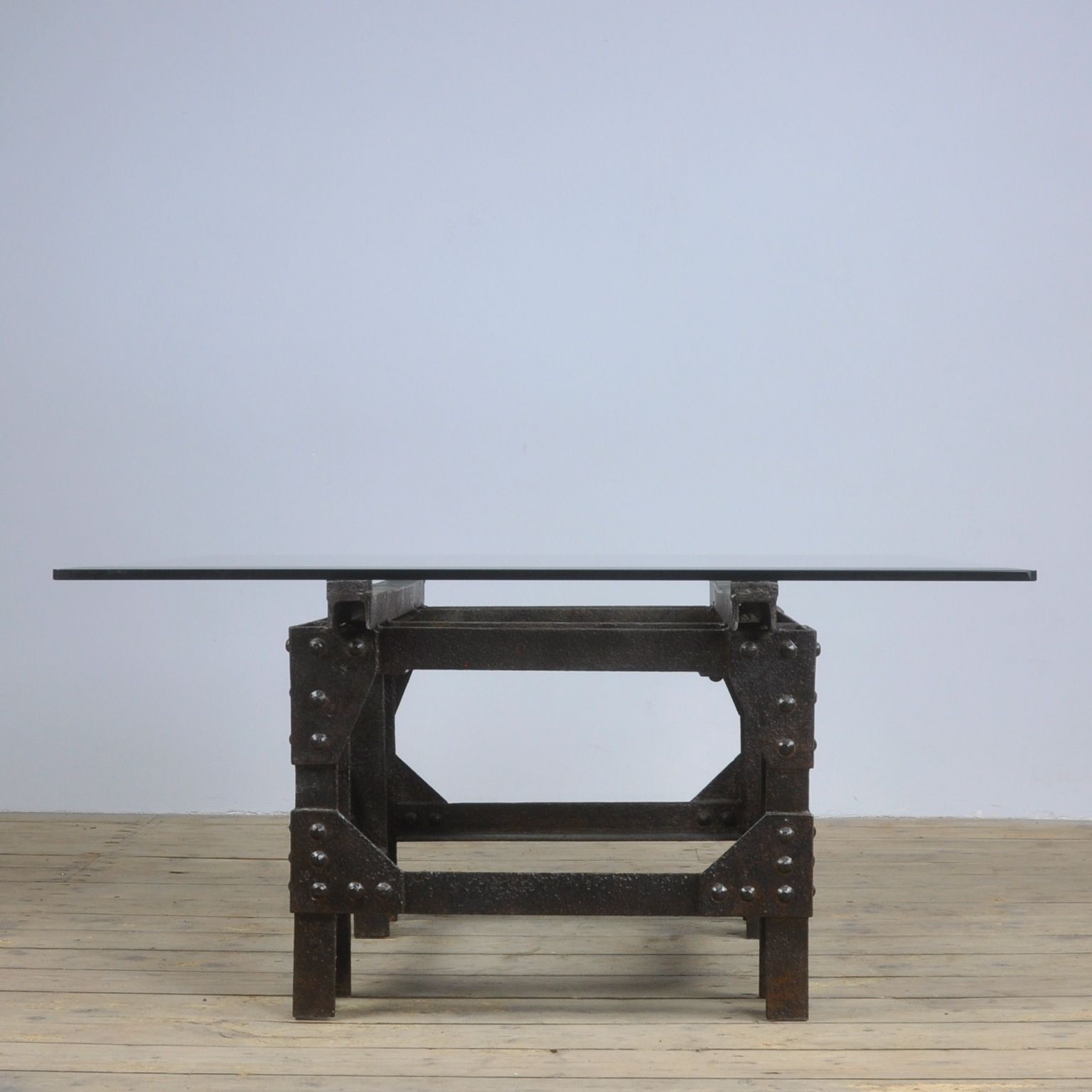 photo furniture Coffee Table Of Cast Iron And Glass Top