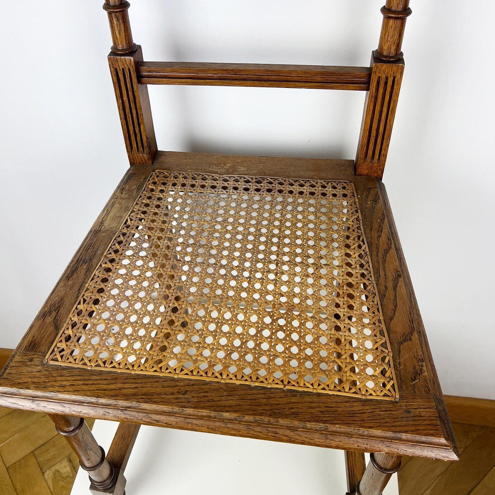 photo furniture Antique Henry II Oak Chair With Cane Seat, Rattan Carved Wood Side Chair