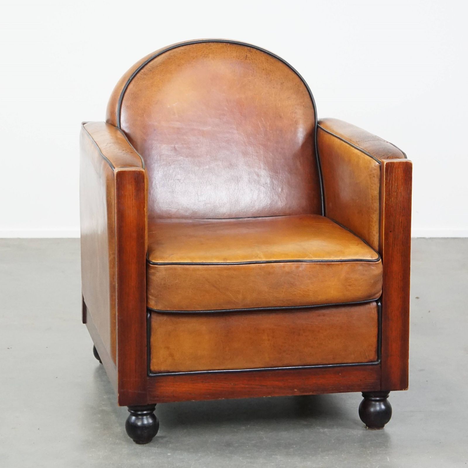 Timeless, Sleekly Finished Sheepskin And Wooden Art Deco Design Armchair With Ball Legs