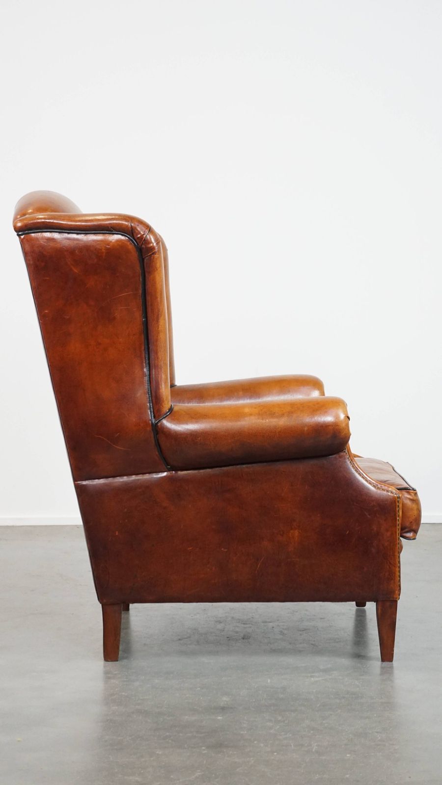 Stylish, Spacious Sheepskin Armchair In A Warm Colour And With Excellent Seating Comfort photo for sale