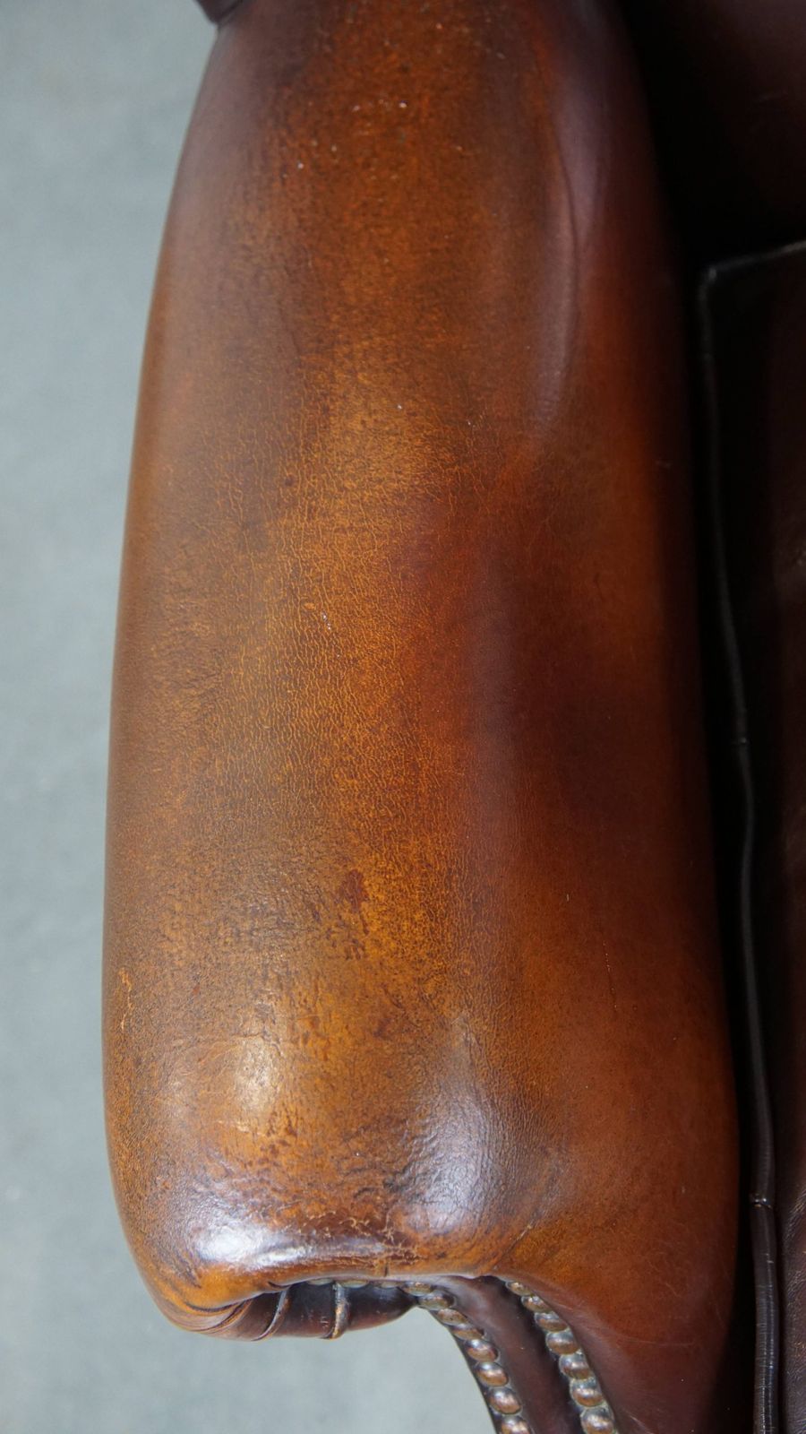 Classic, Luxurious And Comfortable Dark English Style Sheepskin Wing Chair With Lots Of Character And A Beautiful Patina photo buy