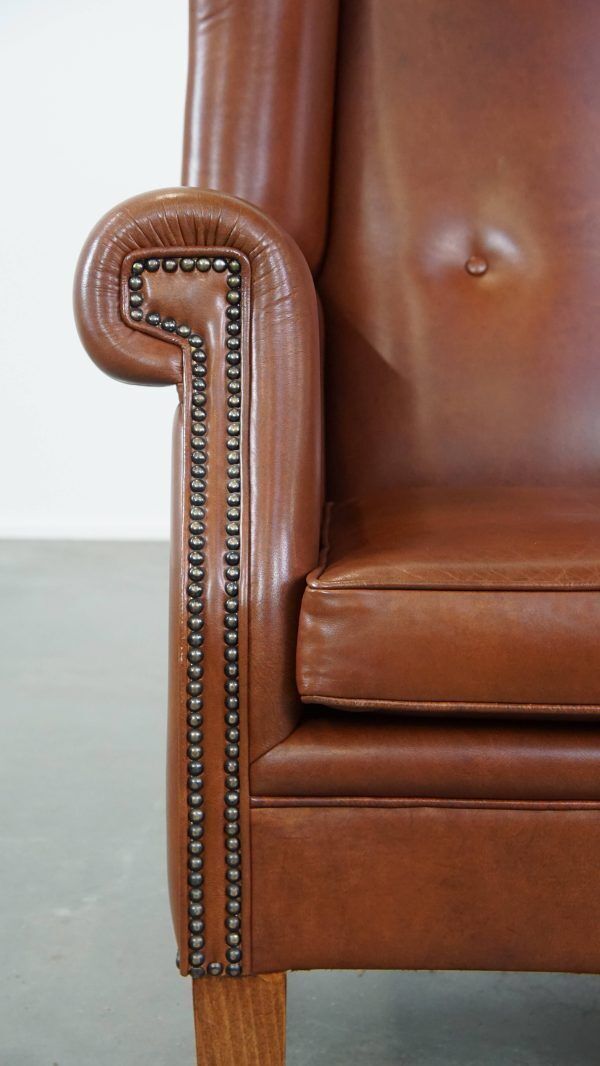 photo furniture Large Cognac Colored Cowhide English Style Wing Chair In Good Condition