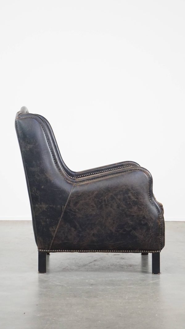 Karaktervolle, Stevige Fauteuil In Zwart Koeienhuid Met Hoge Rug En Decoratieve Siernagels, Industriële Stijl photo for sale