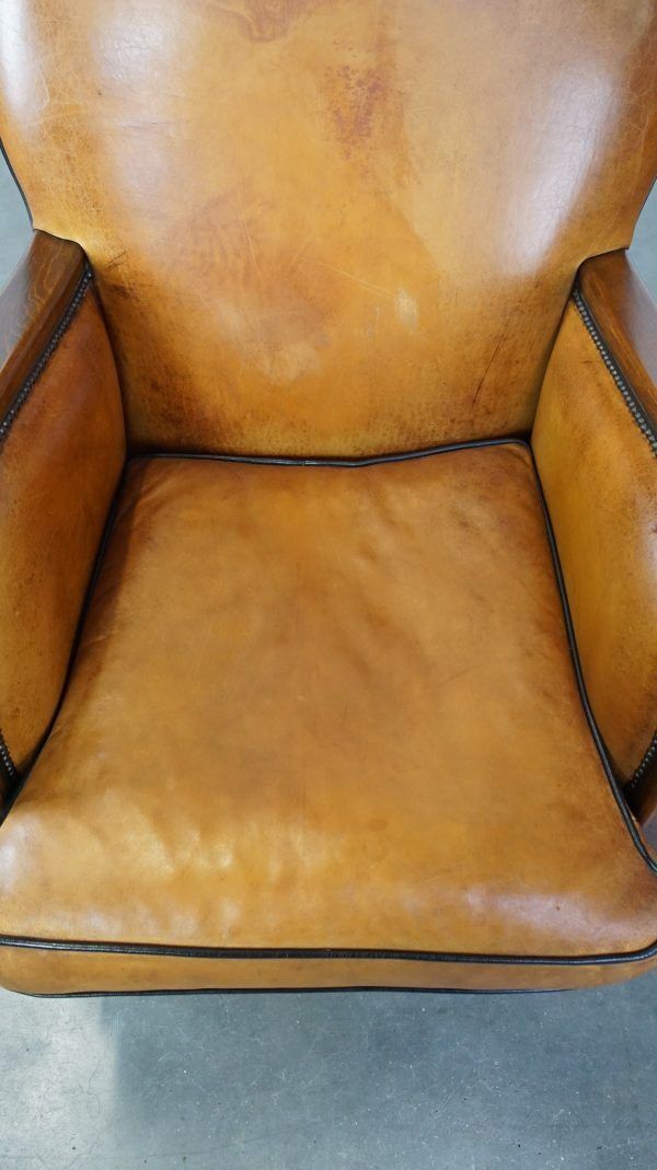 Unique, Luxurious Sheepskin Armchair Combined With Wood And Finished With Decorative Nails photo vinterior