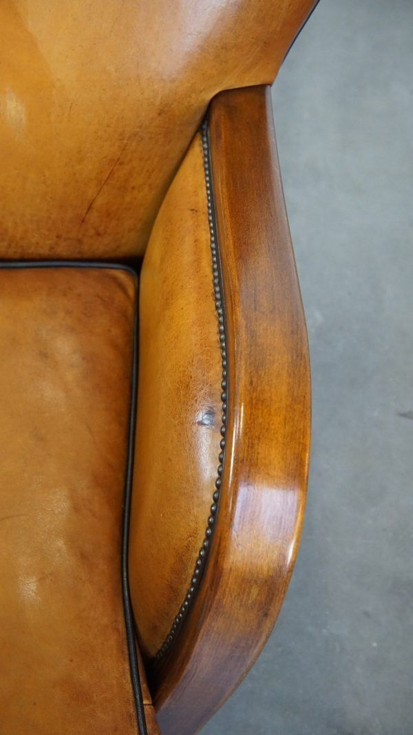 Unique, Luxurious Sheepskin Armchair Combined With Wood And Finished With Decorative Nails photo vintage