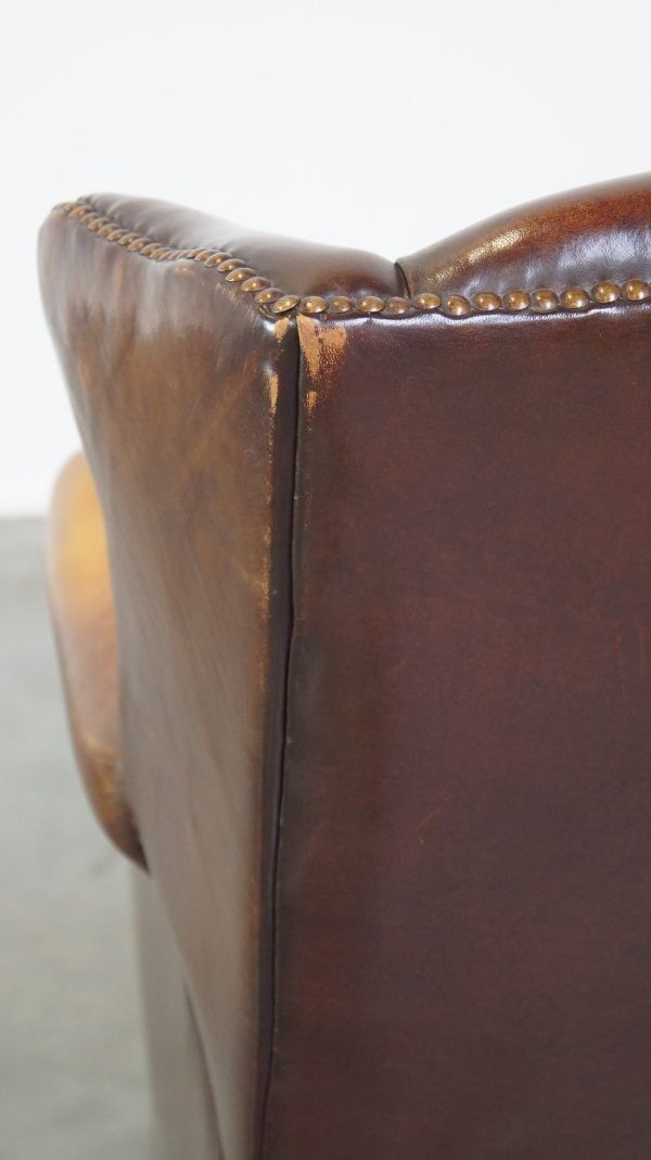 photo vinterior Comfortable, Elegant, Stately Wing Chair Made Of Sheepskin In A Beautiful Warm Color
