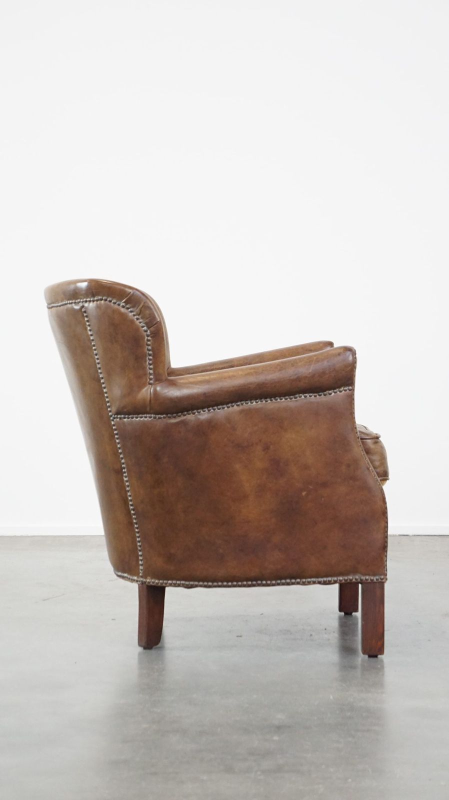 Subtle Cowhide Armchair With A Reversible Kilim Seat Cushion photo for sale