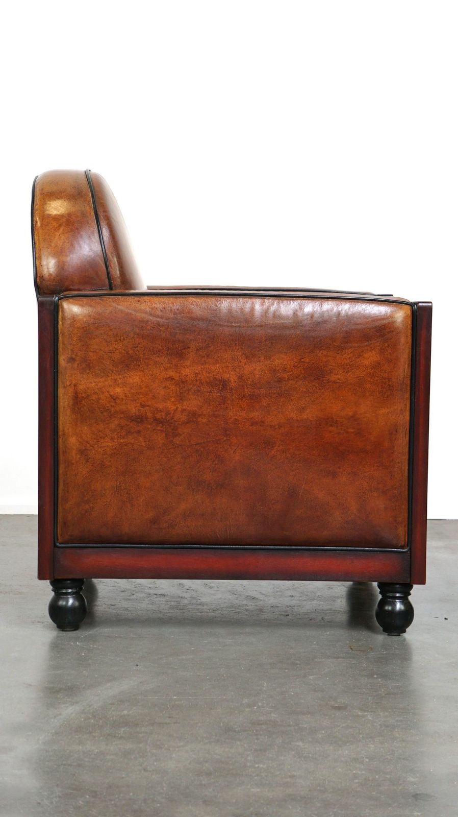 Sheepskin Art Deco Design Armchair Finished With Wood And Beautiful Cognac Colored Leather photo for sale