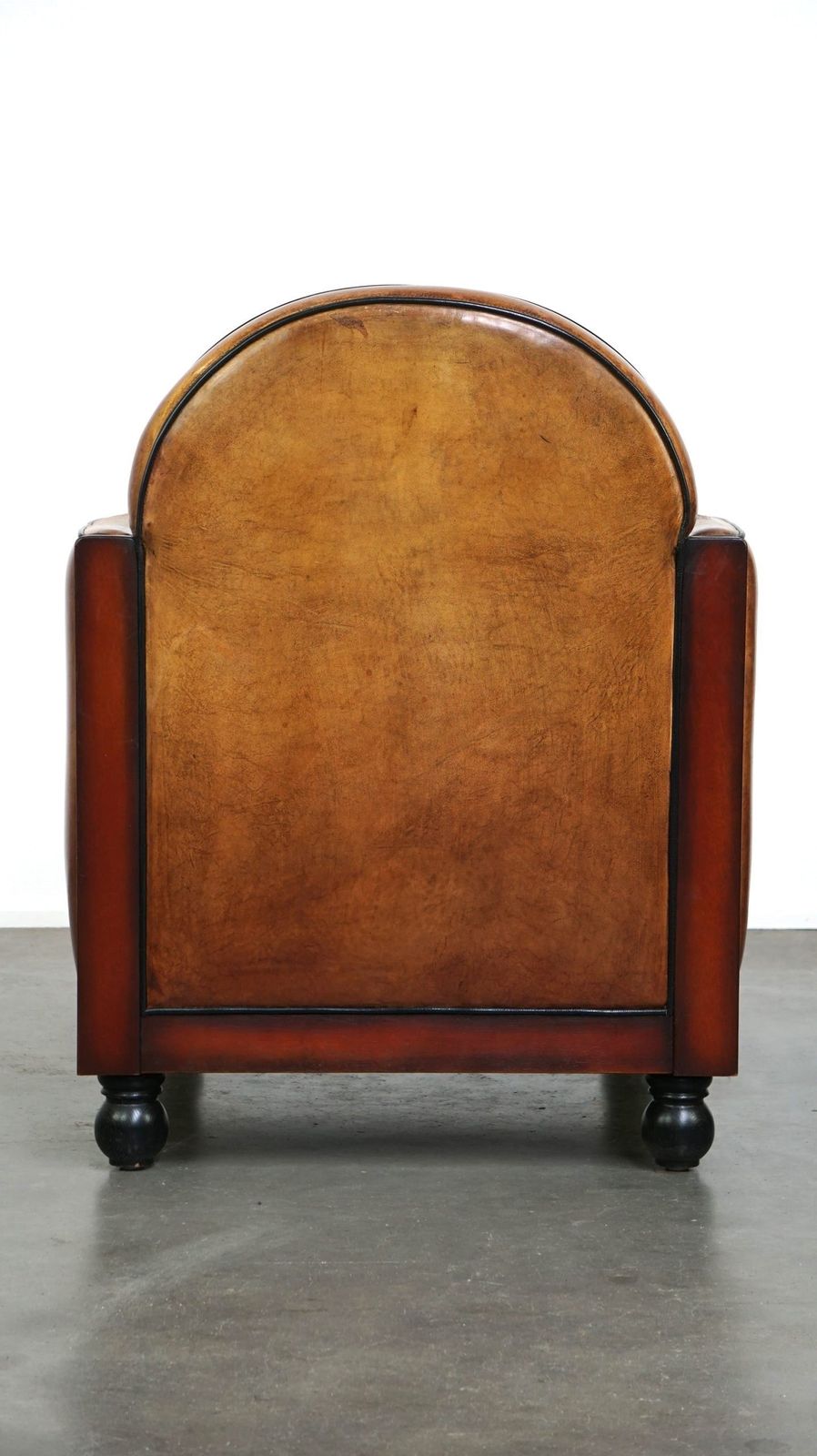 Sheepskin Art Deco Design Armchair Finished With Wood And Beautiful Cognac Colored Leather photo Furniture