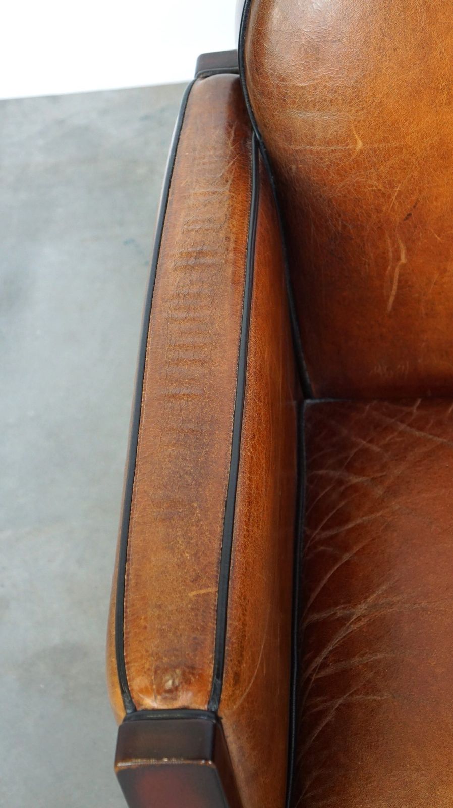 Sheepskin Art Deco Design Armchair Finished With Wood And Beautiful Cognac Colored Leather photo buy