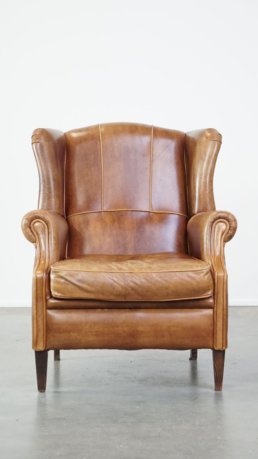 Graceful, Stylish, Timeless And Comfortable Wing Chair Made Of Cowhide In English Style photo furniture