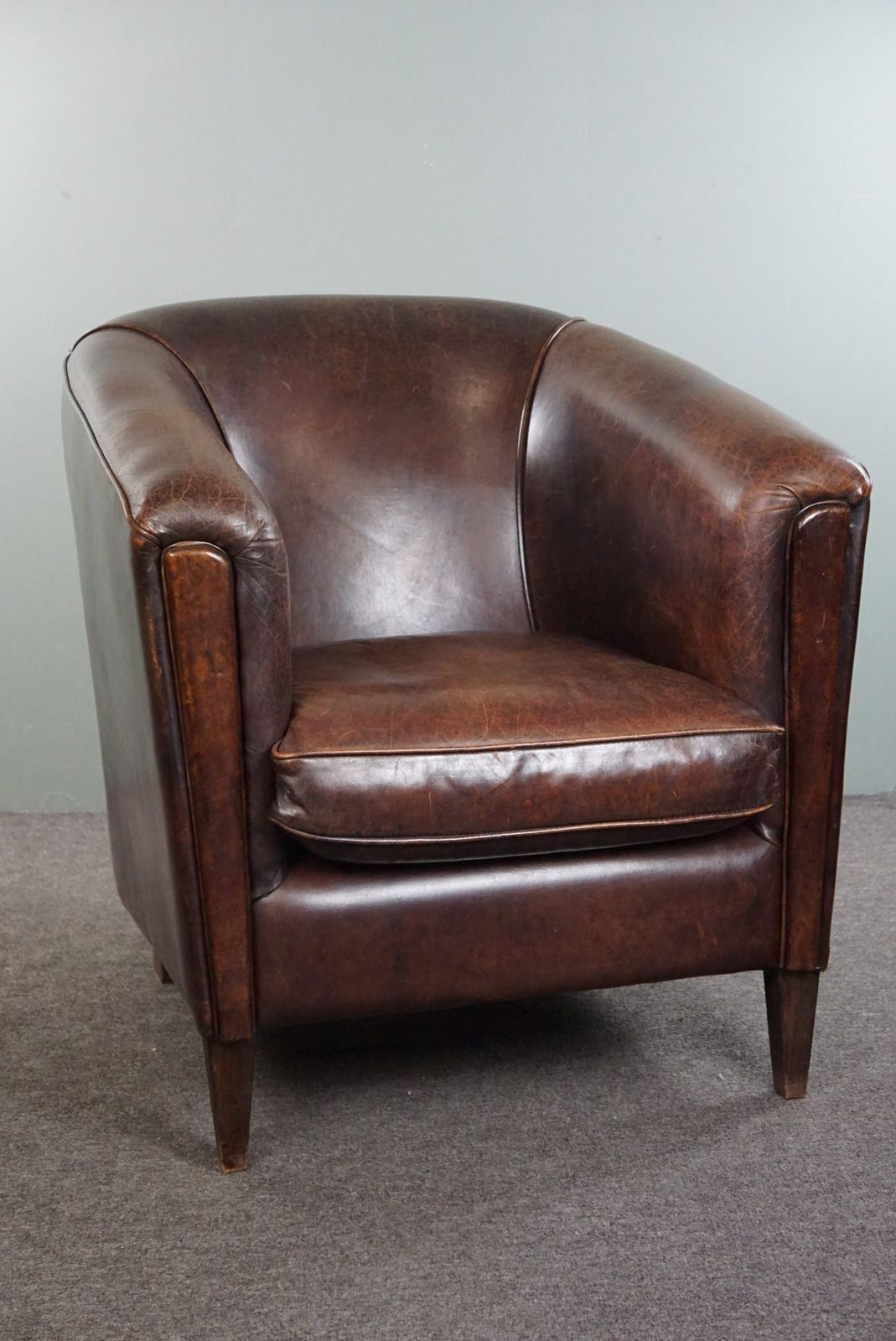 Dark Charming Sheepskin Club Chair With A Sleek Design photo for sale