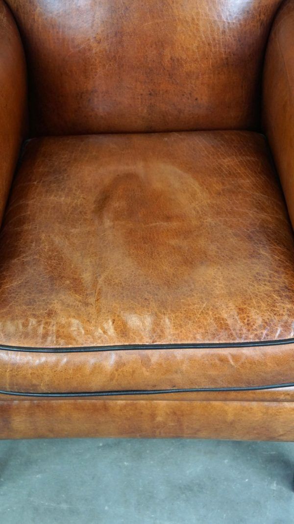 Vintage Schapenleren Fauteuil – Stijlvol En Comfortabel photo vinterior