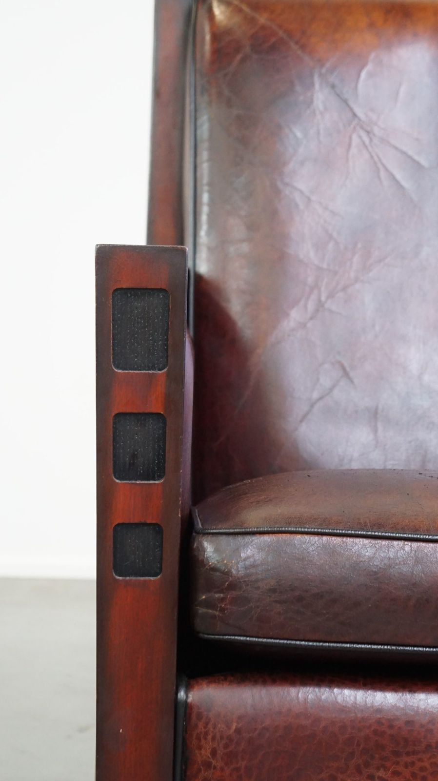 photo furniture Sheepskin Art Deco Design Armchair Combined With Wood And A Beautiful Patina