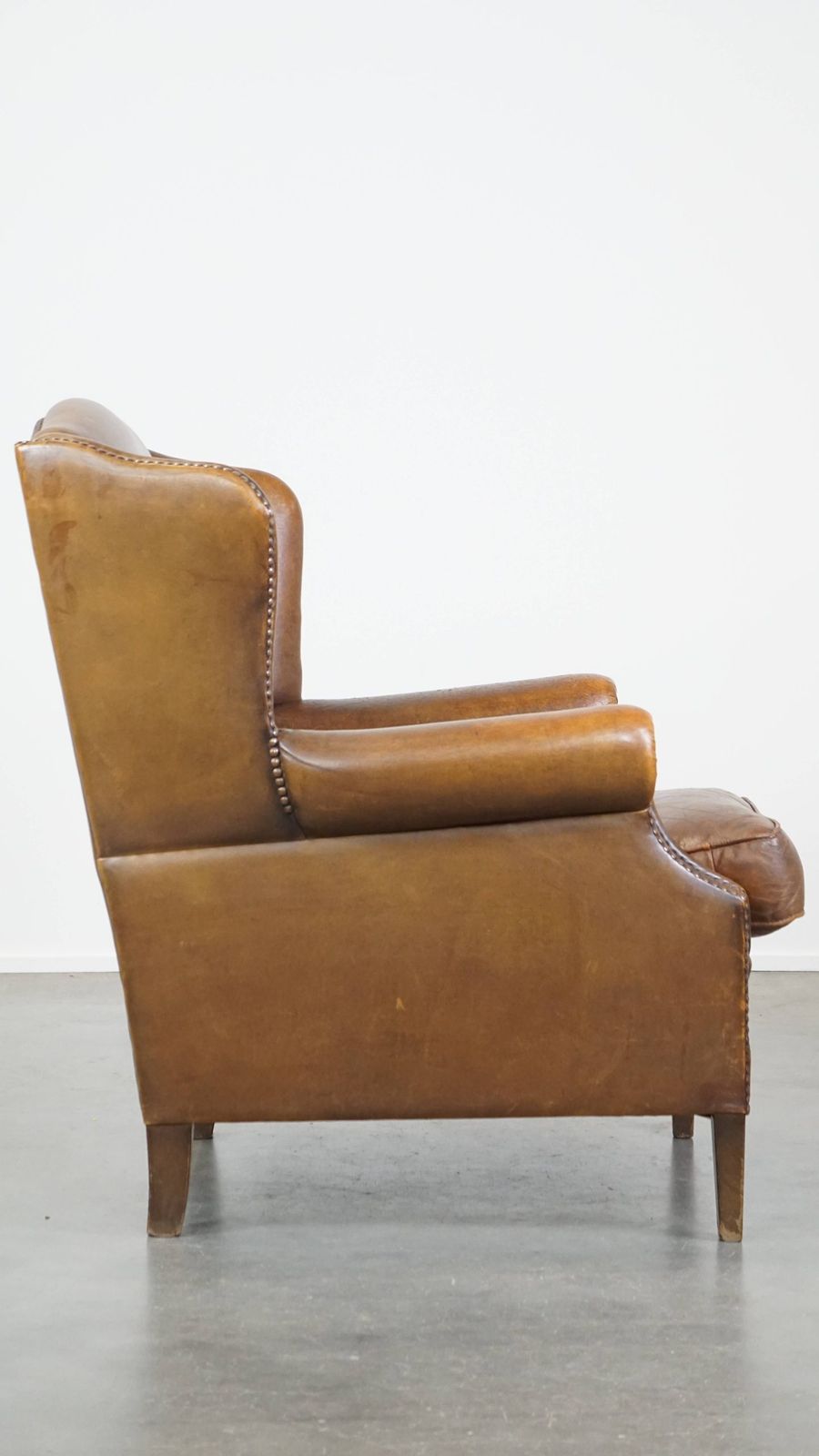 Charming, Subtle English Style Sheepskin Wing Chair With Beautiful Colours And Excellent Seating Comfort photo for sale