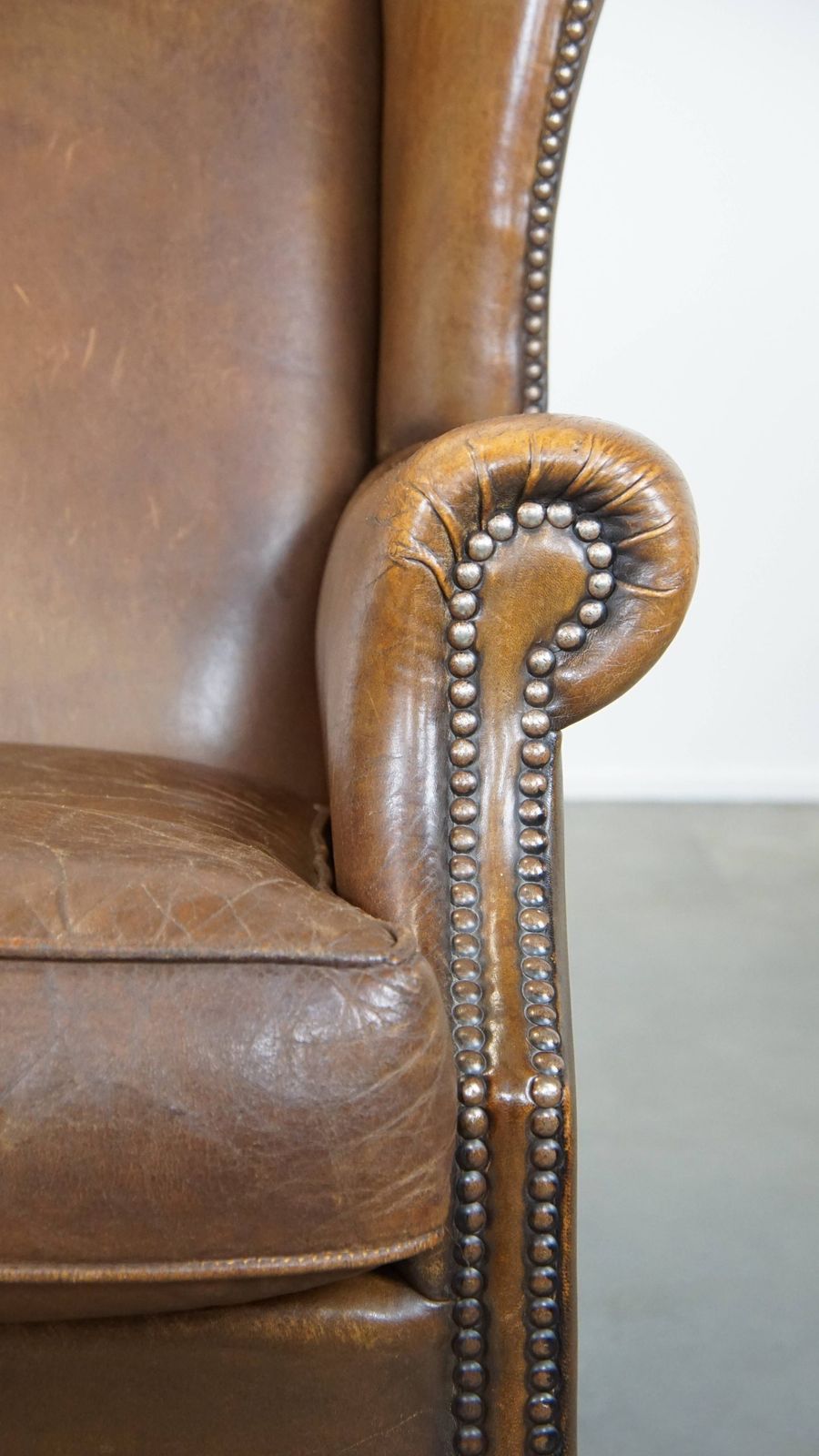 photo for sale Charming, Subtle English Style Sheepskin Wing Chair With Beautiful Colours And Excellent Seating Comfort