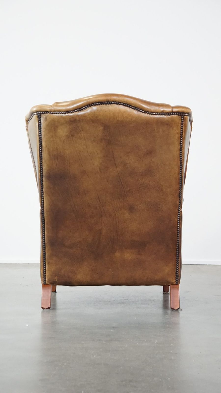 Charming Sheepskin Wing Chair With A Beautiful Patina And Good Seating Comfort photo Furniture