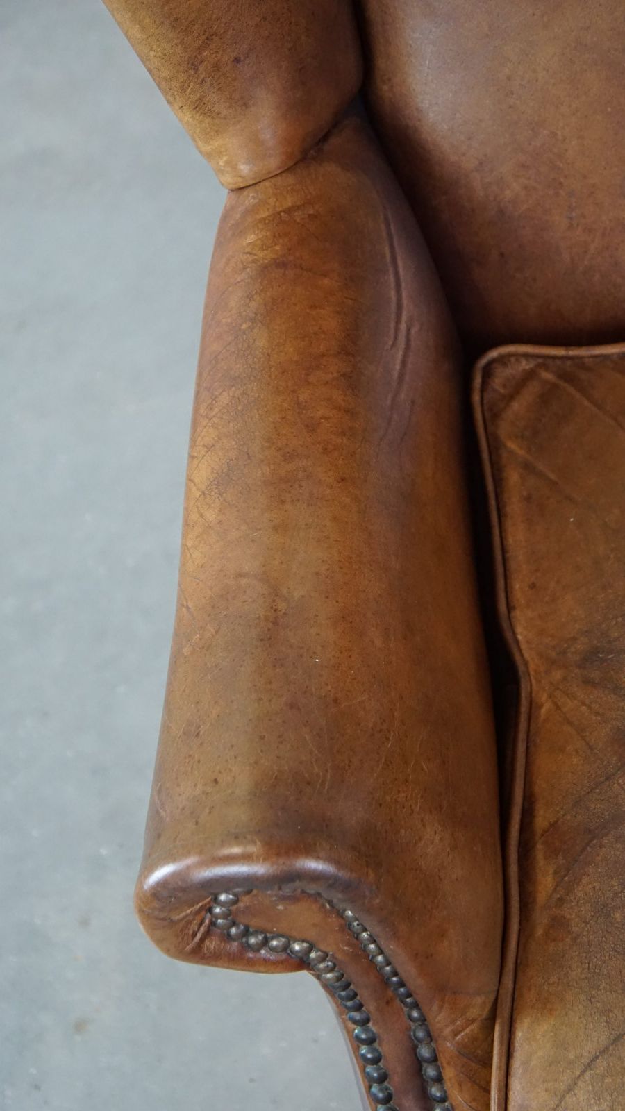Charming Sheepskin Wing Chair With A Beautiful Patina And Good Seating Comfort photo buy