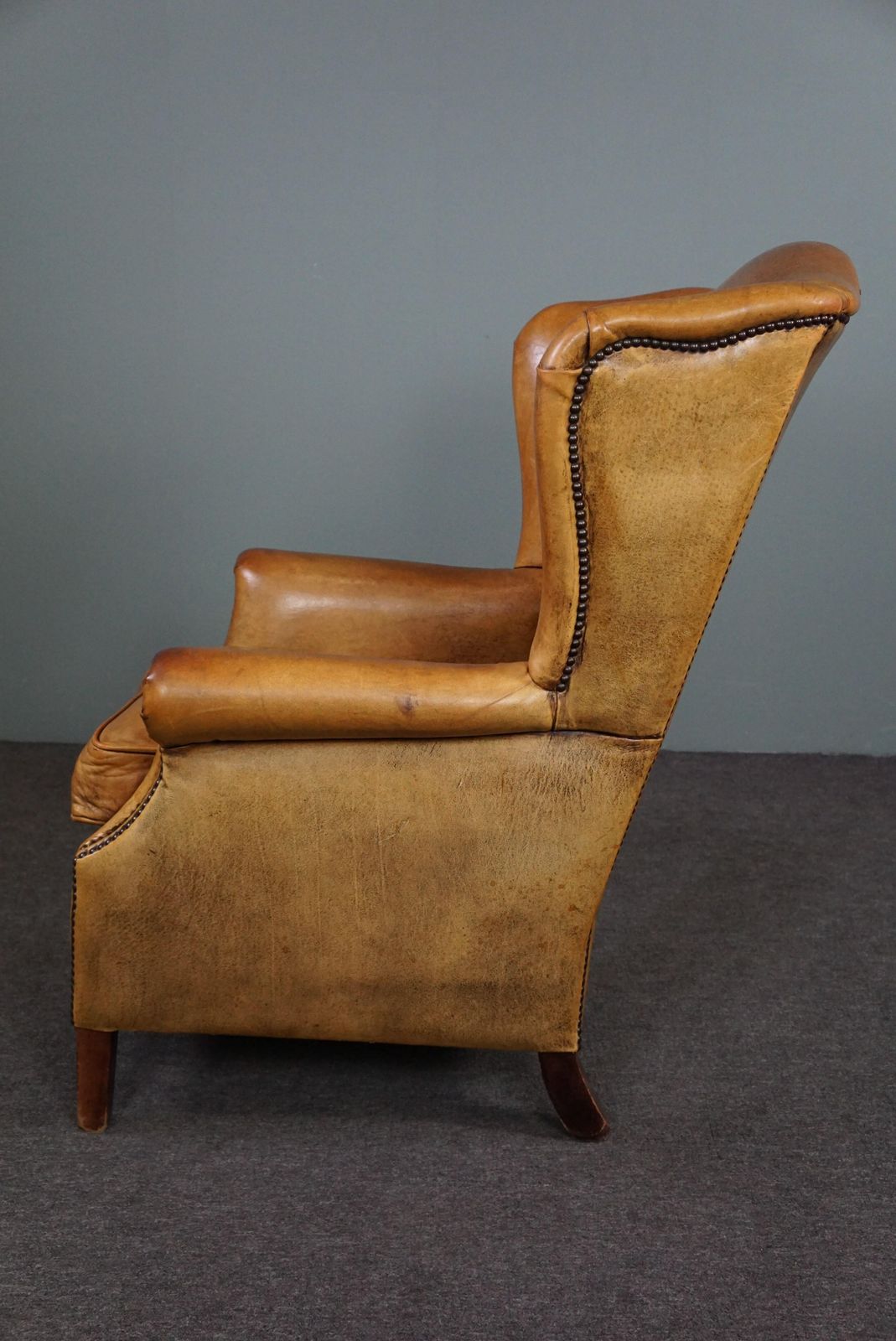 Expressive Cognac Colored Sheepskin Wing Chair photo 907.8054