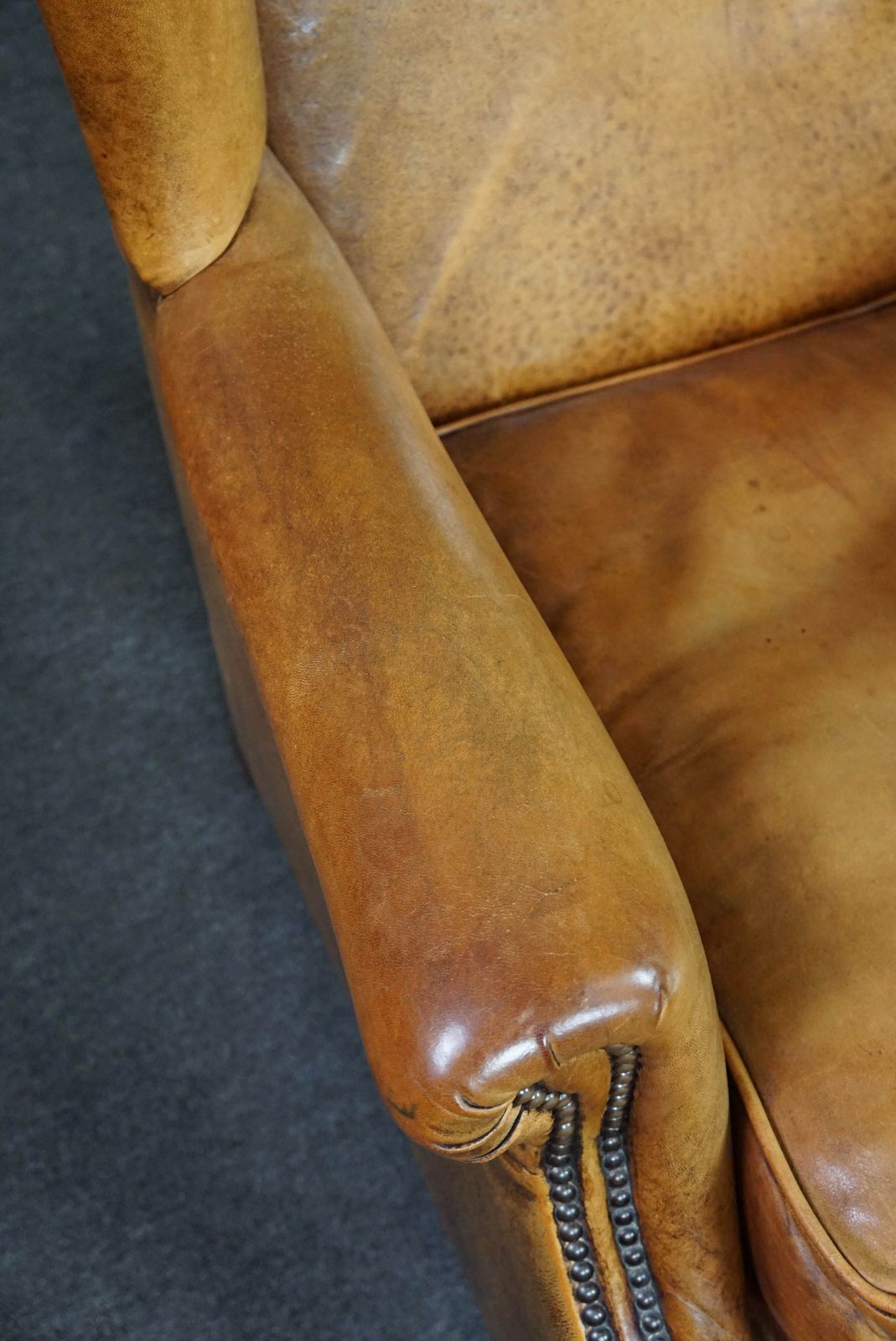 Expressive Cognac Colored Sheepskin Wing Chair photo buy