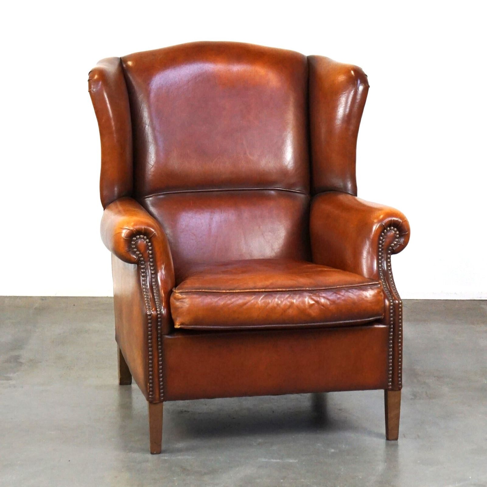 Beautiful And Comfortable Sheepskin Wing Chair With A Wonderful Patina