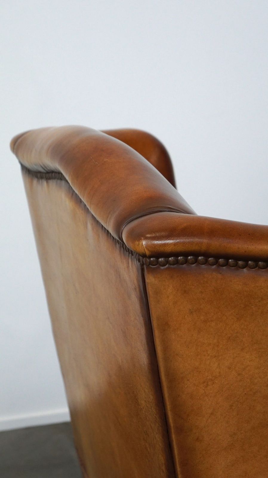 photo for sale Comfortabele Schapenleren Oorfauteuil Met Mooie Patina