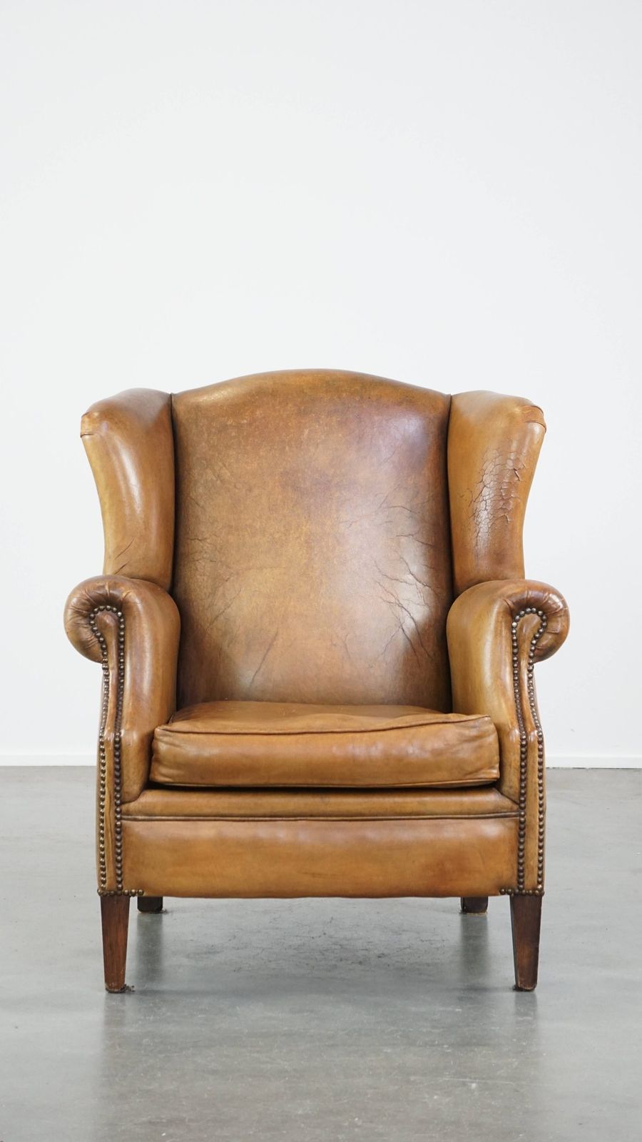 Beautiful Sheepskin Wing Chair With A Very Nice Color And Patina photo furniture