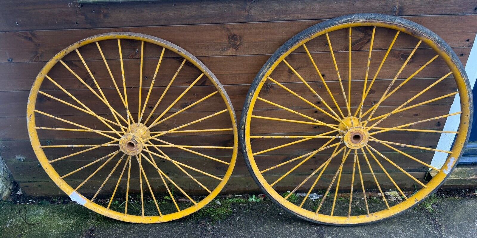 Pair Of Large Antique Yellow Metal Spoked Cartwheels With Vulcanised Tyres