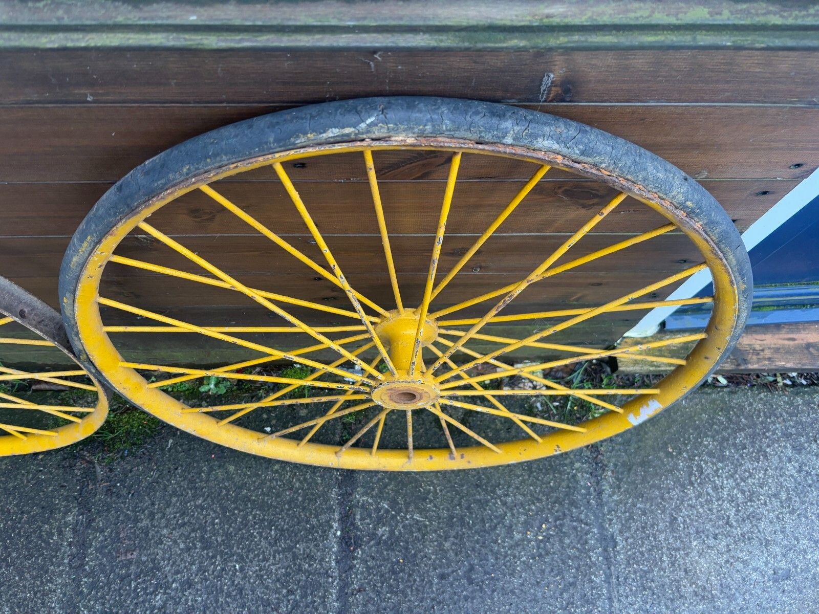 Pair Of Large Antique Yellow Metal Spoked Cartwheels With Vulcanised Tyres photo 95.0