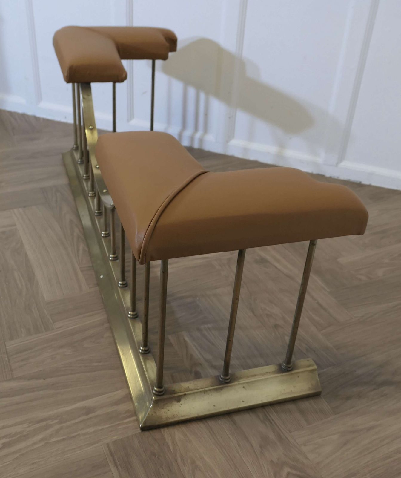 photo furniture Leather Upholstered Brass Club Fender