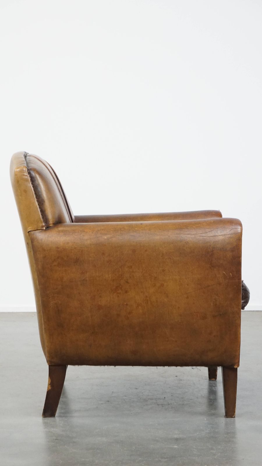 Charming And Characteristic Subtle Patinated Sheepskin Armchair With A Wonderful Patina photo for sale