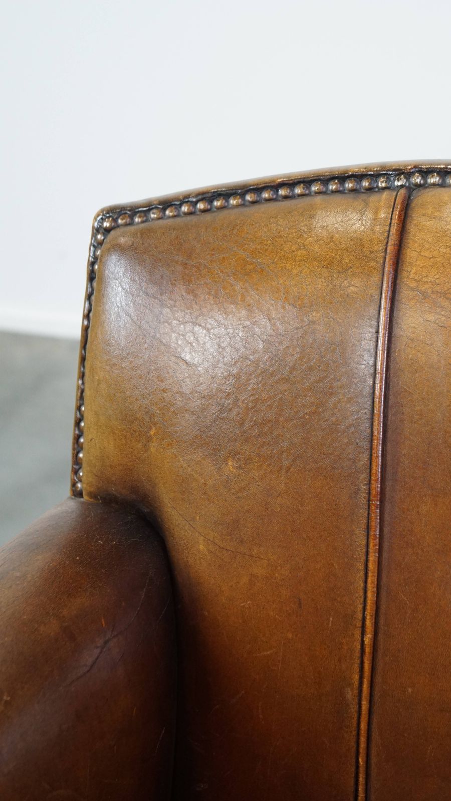 photo for sale Charming And Characteristic Subtle Patinated Sheepskin Armchair With A Wonderful Patina