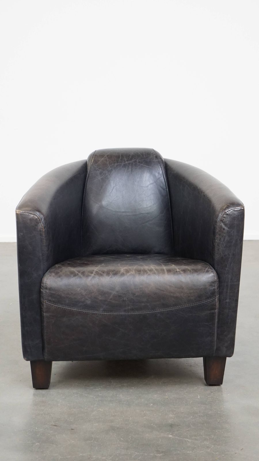 Black Cowhide Aviator Armchair With A Sleek Design And A Nice Shape photo furniture