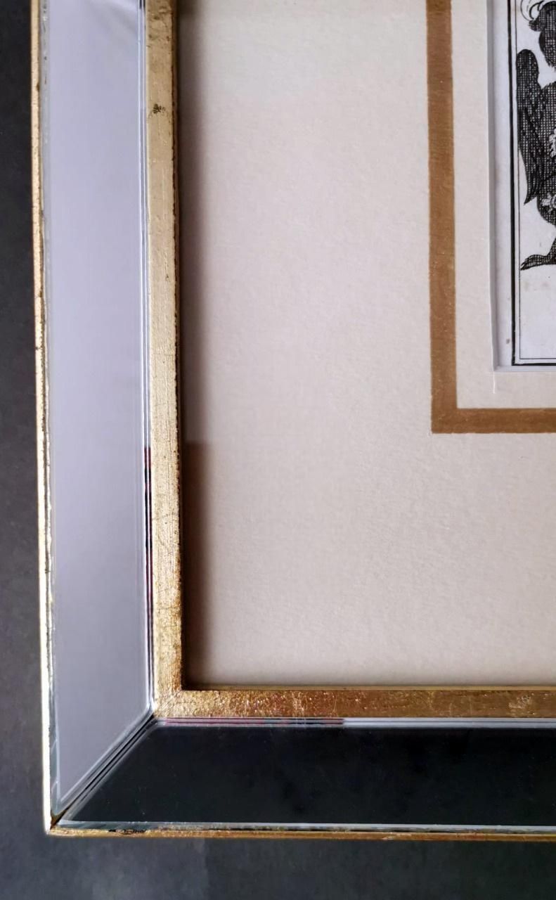 Art Mirror Frame With Engraved Dutch Print Depicting Dukes Of Mirandola Coat Of Arms photo