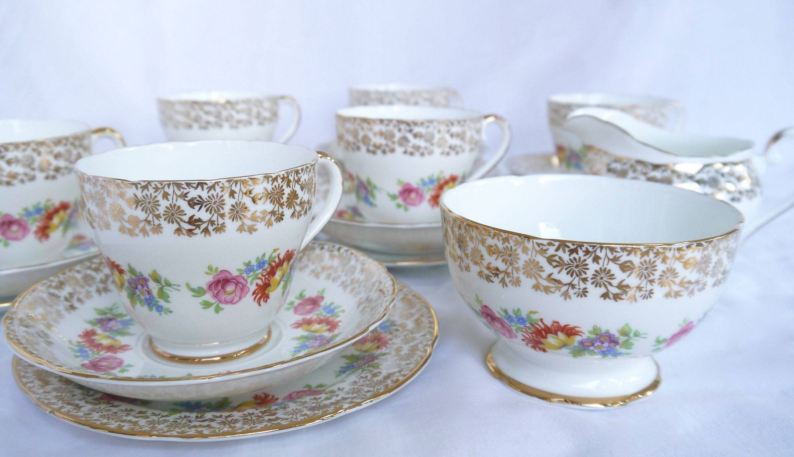 Imperial Bone China Tea Cup Trios With Milk Jug And Sugar Bowl, 6 Bone China Floral And Gold Tea Cups, Saucers And Plates. photo furniture