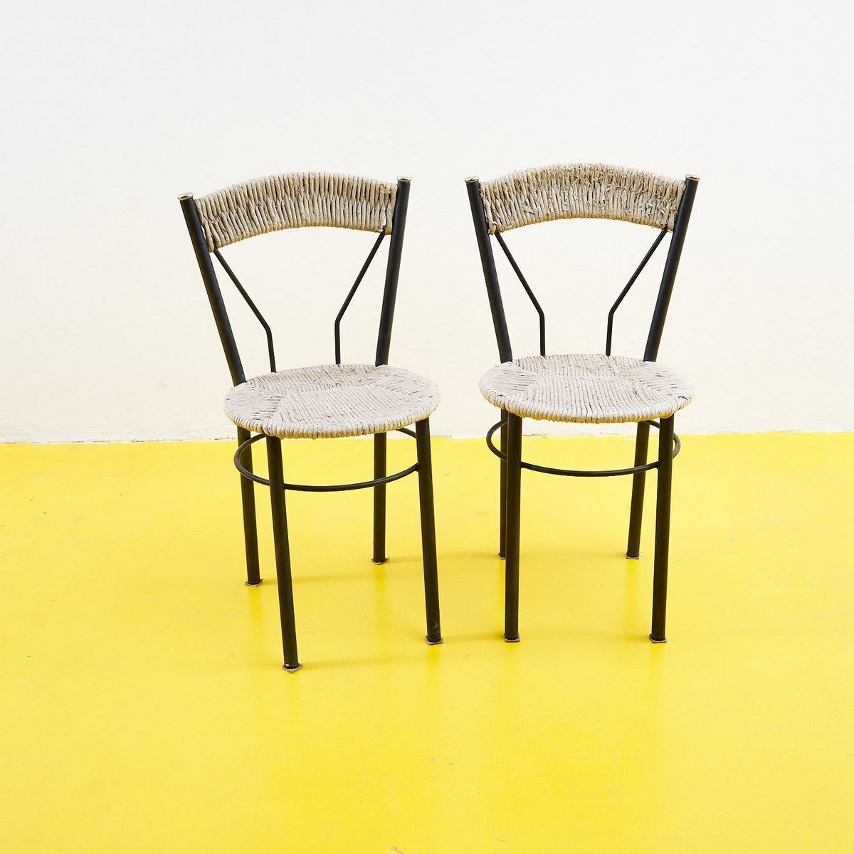 Pair Of Straw Covered Metal Chairs