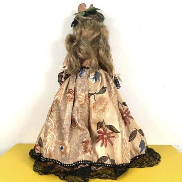 Elegant Vintage Doll With Ceramic Parts photo vinterior